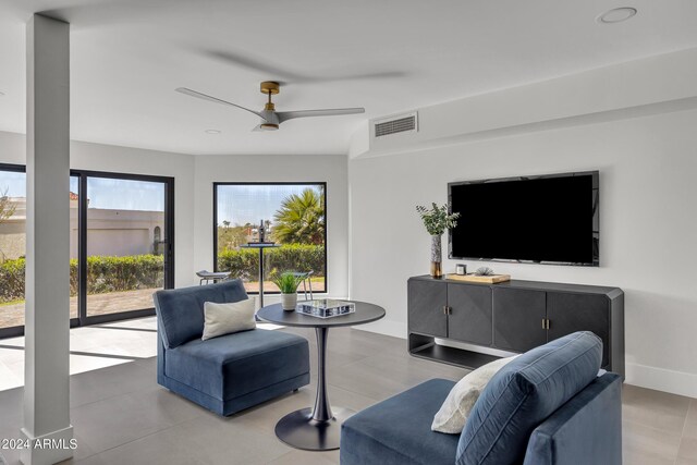 3800 E Lincoln Dr Unit 42, Phoenix, AZ 85018 - living area with ceiling fan and baseboards