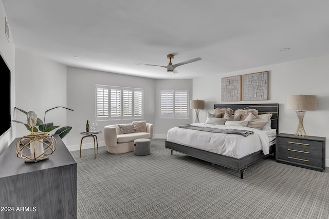 3800 E Lincoln Dr Unit 42, Phoenix, AZ 85018 - bedroom featuring carpet floors, a ceiling fan, and baseboards