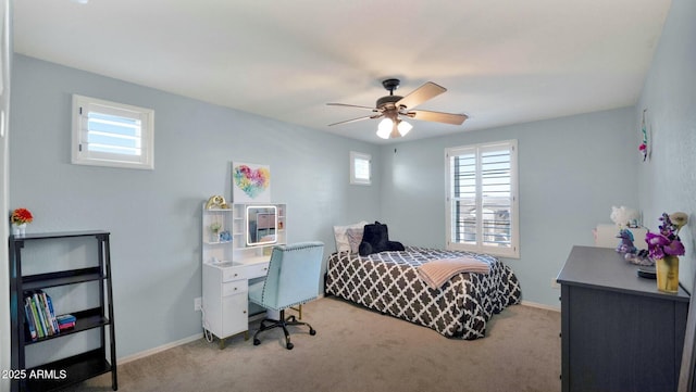 bedroom with light carpet and ceiling fan