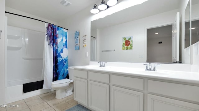 full bathroom featuring tile patterned floors, vanity, shower / bath combination with curtain, and toilet