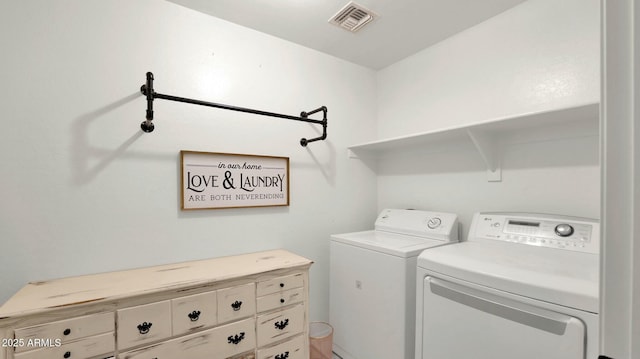 laundry room featuring washer and dryer