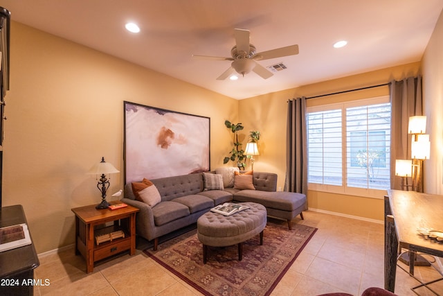 tiled living room with ceiling fan