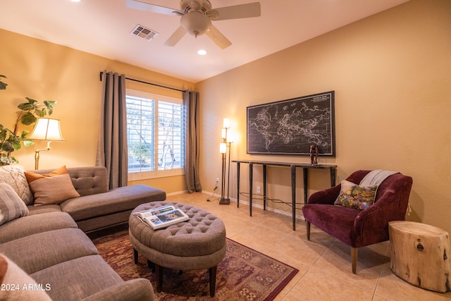 living room with light tile patterned floors and ceiling fan