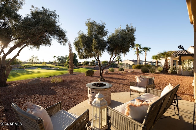 view of patio / terrace featuring a fire pit