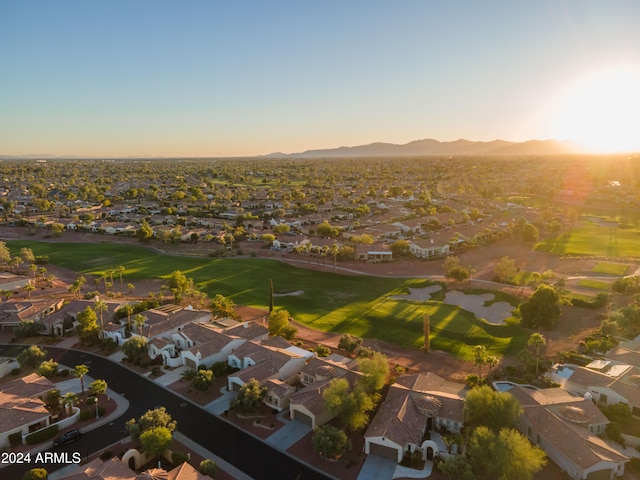 aerial view at dusk with a mountain view