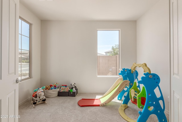 rec room featuring carpet floors