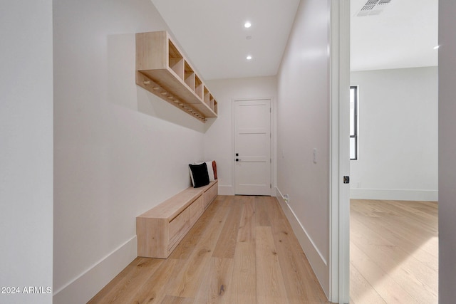 corridor featuring light hardwood / wood-style flooring