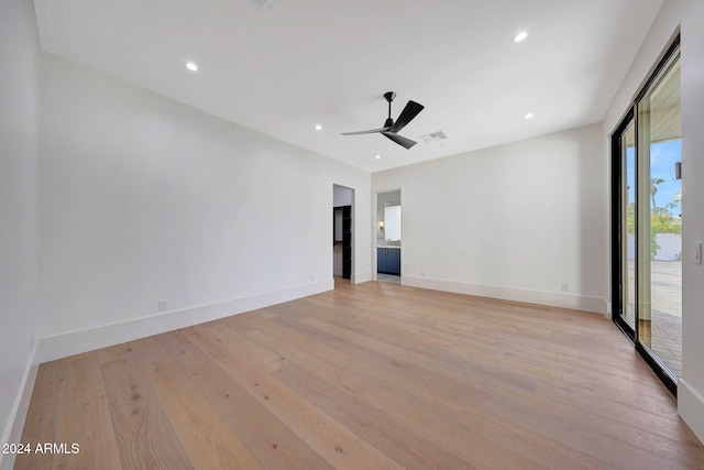 unfurnished room with light hardwood / wood-style floors and ceiling fan