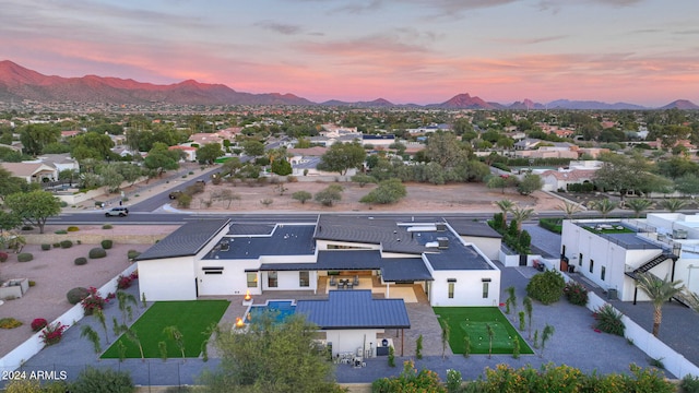 aerial view at dusk with a mountain view