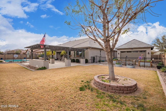 rear view of house with a pergola, a lawn, and a fenced in pool