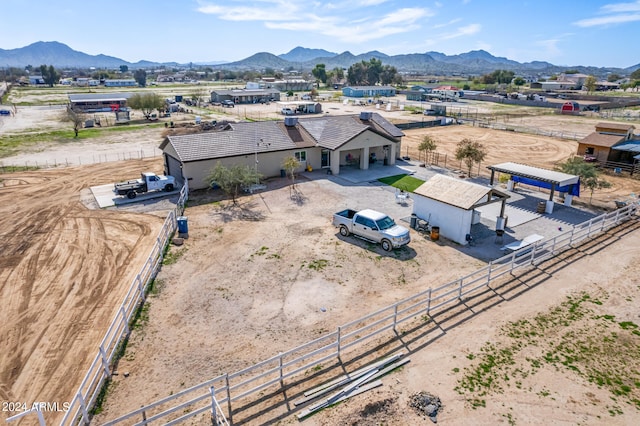 bird's eye view featuring a rural view and a mountain view