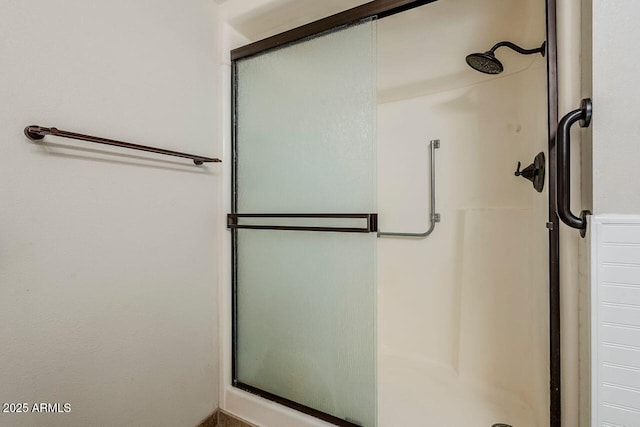 bathroom featuring walk in shower