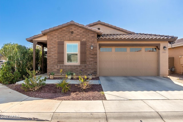 view of front of property featuring a garage