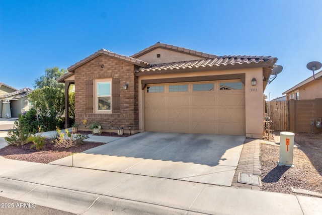 mediterranean / spanish-style home featuring a garage