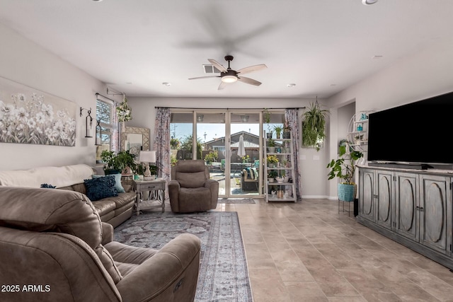 living room featuring ceiling fan