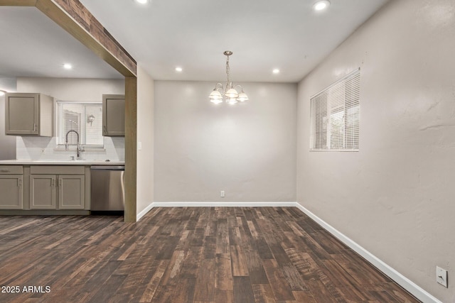 2022 E Mulberry Dr, Phoenix, AZ 85016 - kitchen featuring stainless steel dishwasher, gray cabinets, dark wood finished floors, recessed lighting, and light countertops