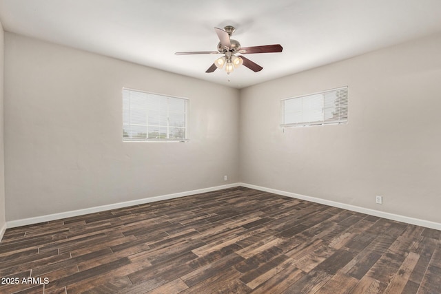 2022 E Mulberry Dr, Phoenix, AZ 85016 - unfurnished room featuring dark wood finished floors, plenty of natural light, and baseboards