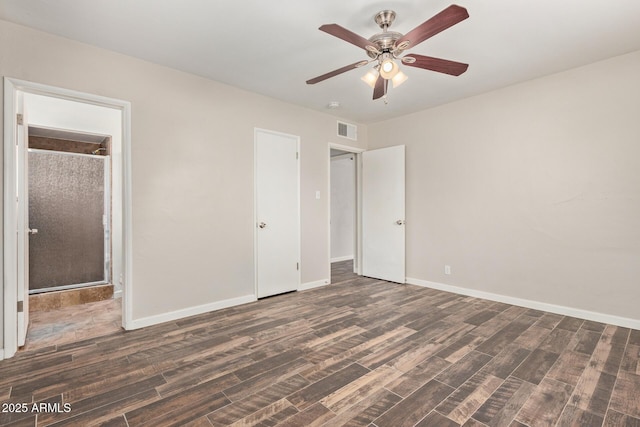 2022 E Mulberry Dr, Phoenix, AZ 85016 - unfurnished bedroom featuring wood finished floors, baseboards, and a ceiling fan