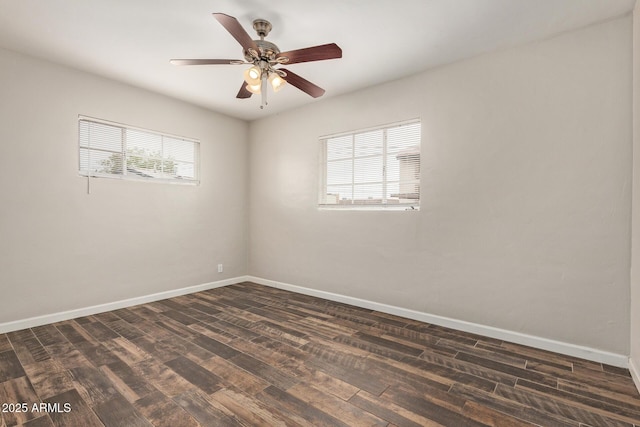 2022 E Mulberry Dr, Phoenix, AZ 85016 - empty room with dark wood-style floors, baseboards, and a ceiling fan