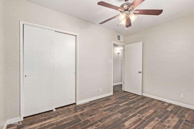 2022 E Mulberry Dr, Phoenix, AZ 85016 - unfurnished bedroom featuring wood finished floors, a closet, baseboards, and ceiling fan
