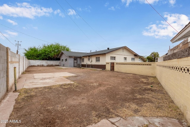 2022 E Mulberry Dr, Phoenix, AZ 85016 - back of house featuring a fenced backyard and a patio area