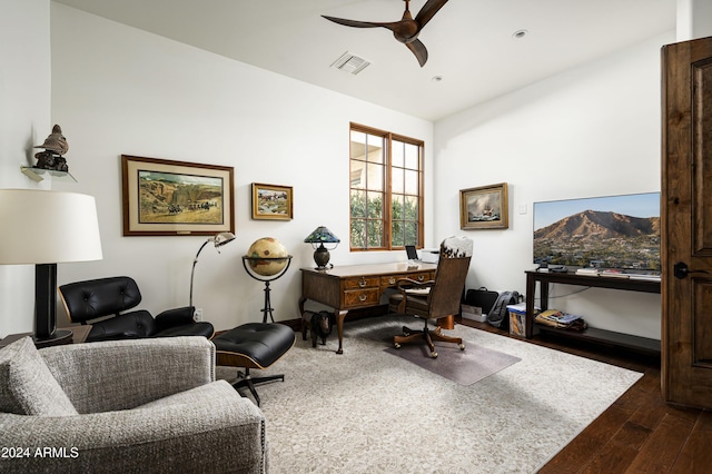 office space with ceiling fan and dark wood-type flooring