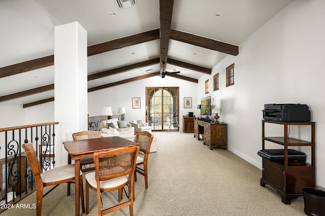 dining space with vaulted ceiling with beams, ceiling fan, and carpet