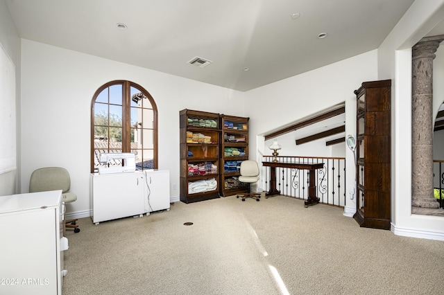 interior space with independent washer and dryer and light colored carpet