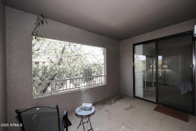 interior space with a balcony