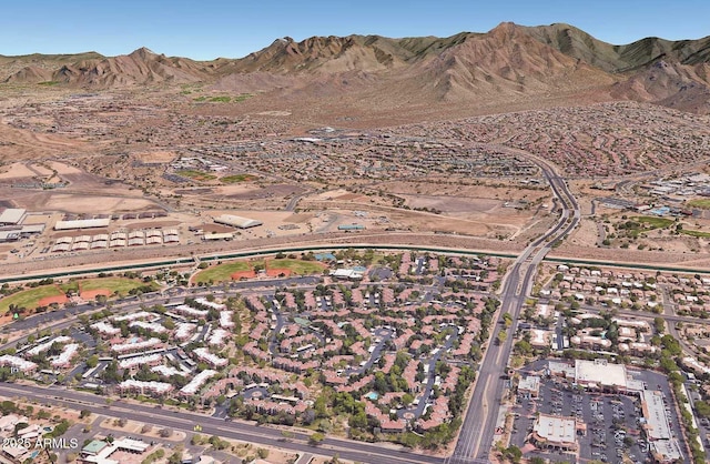 birds eye view of property featuring a mountain view