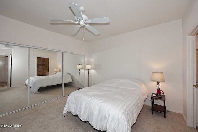 bedroom featuring a closet, carpet flooring, and ceiling fan