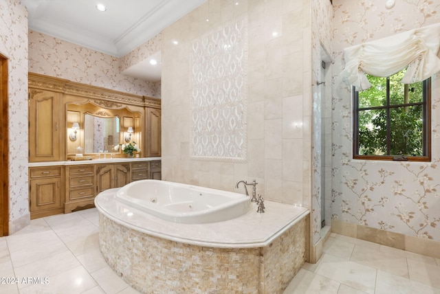 bathroom with tile floors, ornamental molding, independent shower and bath, and vanity