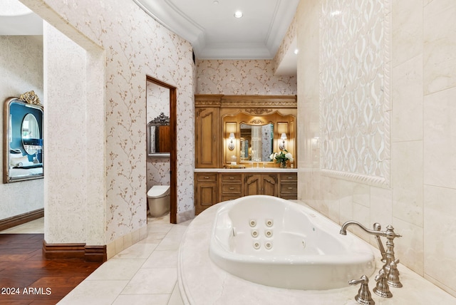 bathroom with vanity, hardwood / wood-style flooring, tile walls, and crown molding