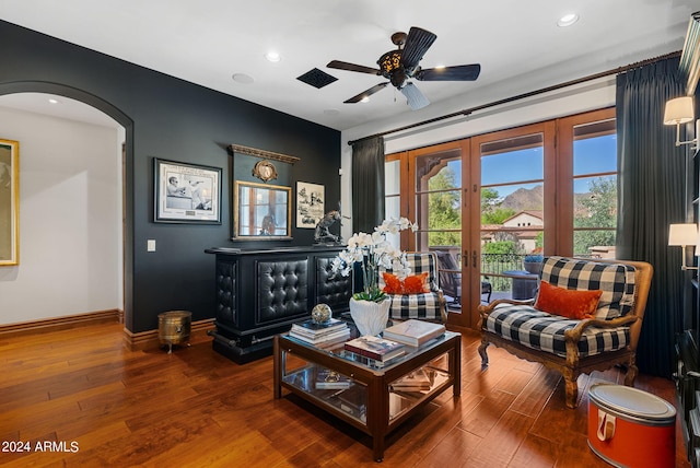 living room with french doors, ceiling fan, and hardwood / wood-style floors