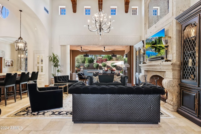 tiled living room featuring a notable chandelier and a towering ceiling