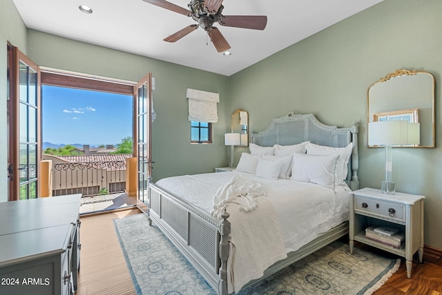 bedroom with ceiling fan and access to exterior