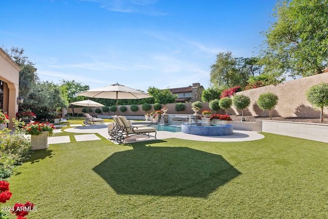 view of yard with a fenced in pool