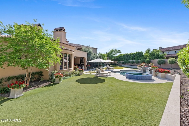 view of yard featuring a patio area and french doors