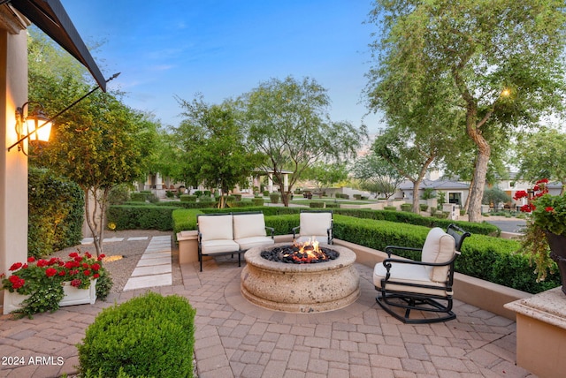 view of patio / terrace with an outdoor fire pit