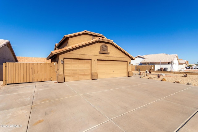 exterior space featuring a garage