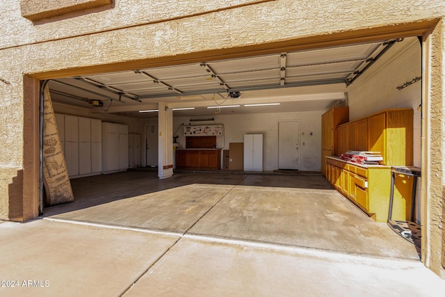 garage featuring a garage door opener