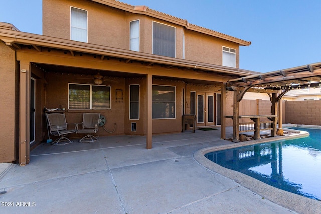 view of pool with a patio area and a pergola