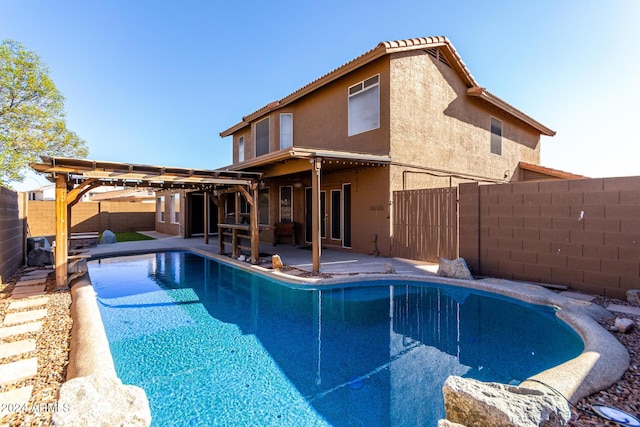 view of swimming pool featuring a patio area