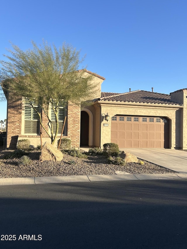 view of front of home featuring a garage