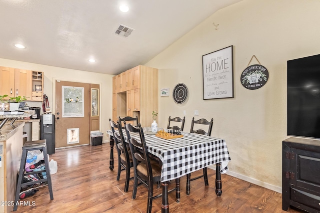 7259 E Glencove St, Mesa, AZ 85207 - dining space featuring lofted ceiling, light wood-style floors, and recessed lighting