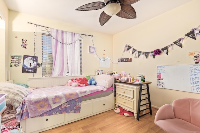 7259 E Glencove St, Mesa, AZ 85207 - bedroom with light wood-type flooring and a ceiling fan