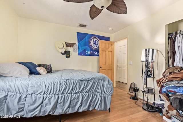 7259 E Glencove St, Mesa, AZ 85207 - bedroom with light wood-style flooring and ceiling fan