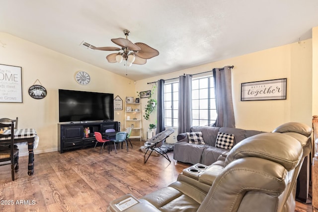 7259 E Glencove St, Mesa, AZ 85207 - living area with lofted ceiling, ceiling fan, and wood finished floors