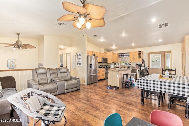 7259 E Glencove St, Mesa, AZ 85207 - living area with a ceiling fan, vaulted ceiling, wood finished floors, and recessed lighting