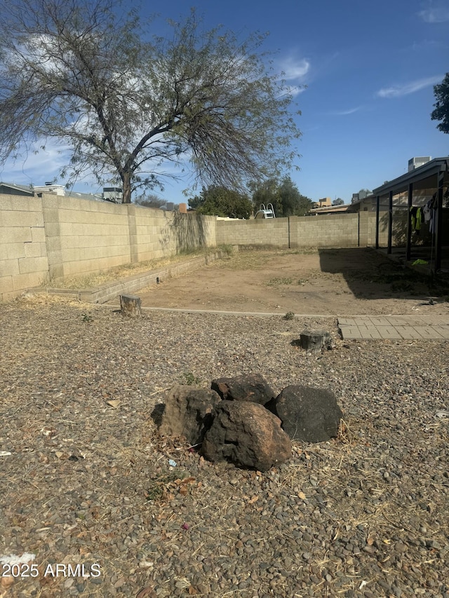 view of yard with fence